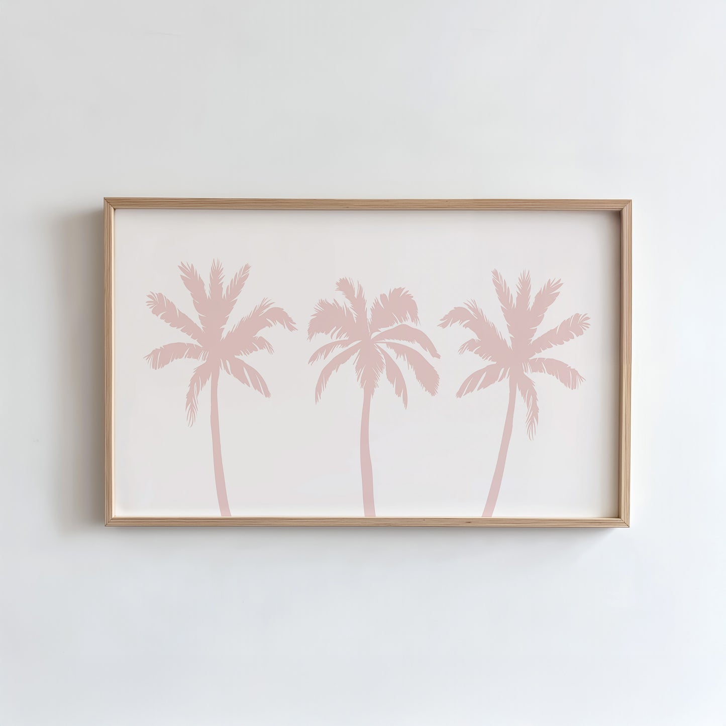 Framed artwork with pink palm tree design on a white background