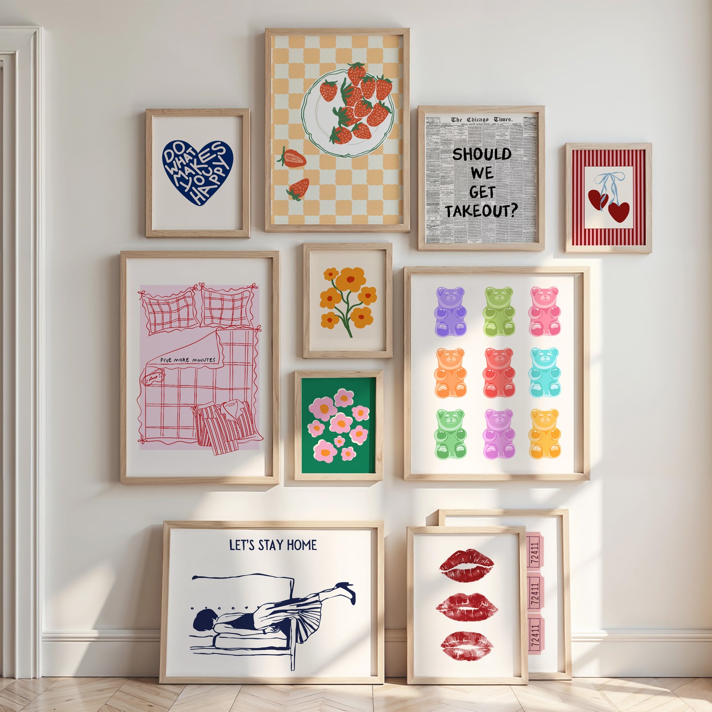 Collection of framed artworks on a wall