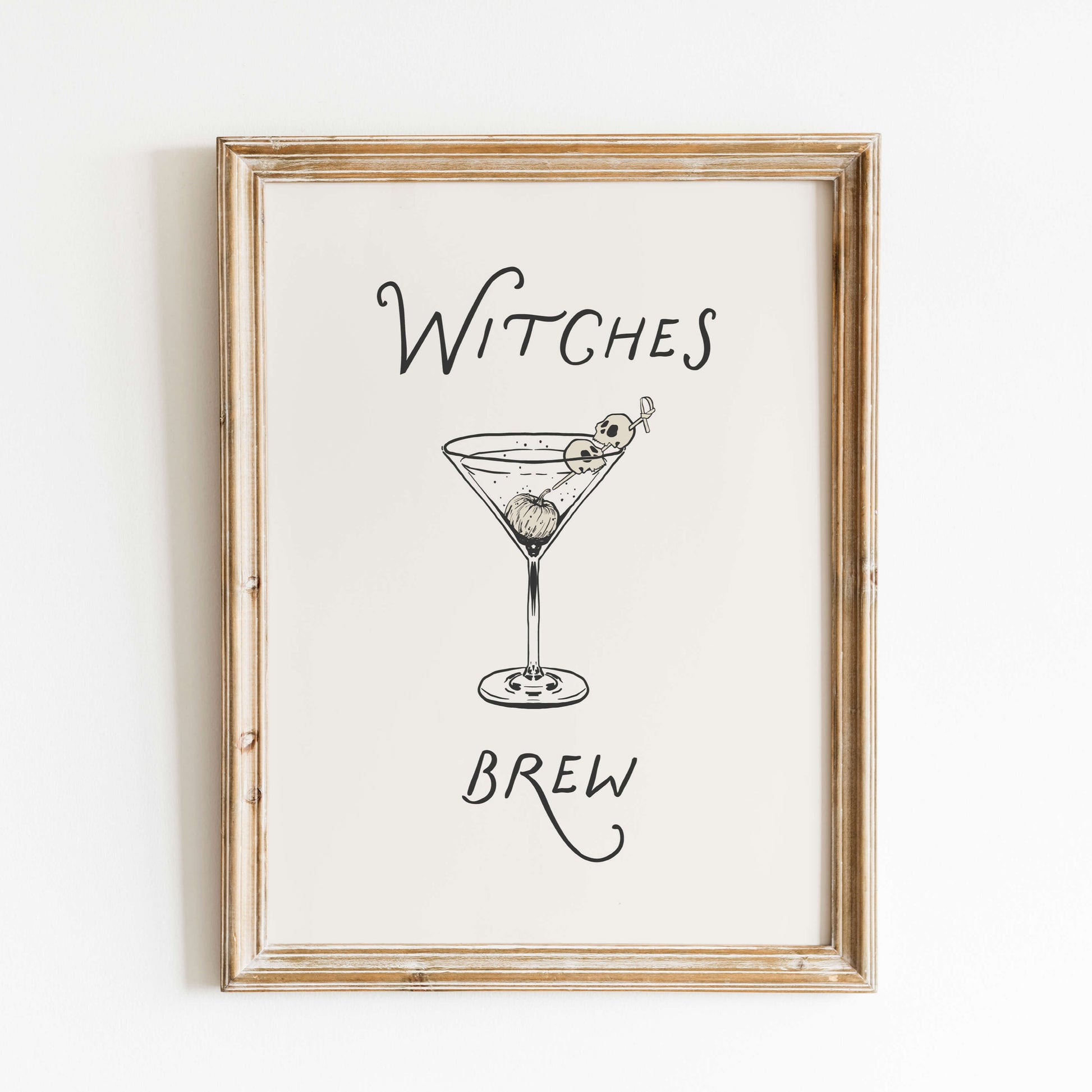 Framed artwork with a martini glass and text on a white background