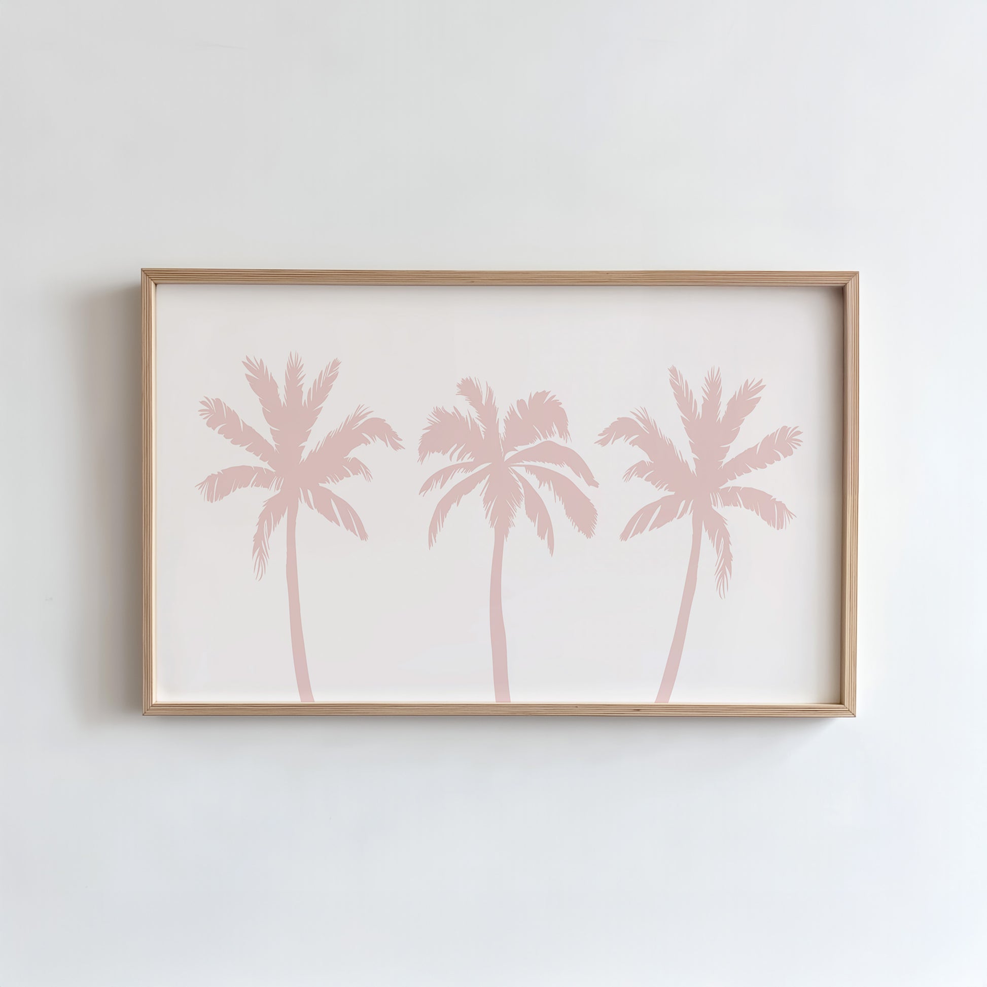 Framed artwork with pink palm tree design on a white background
