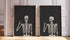 Two framed skeleton prints on a wall with decorative molding.